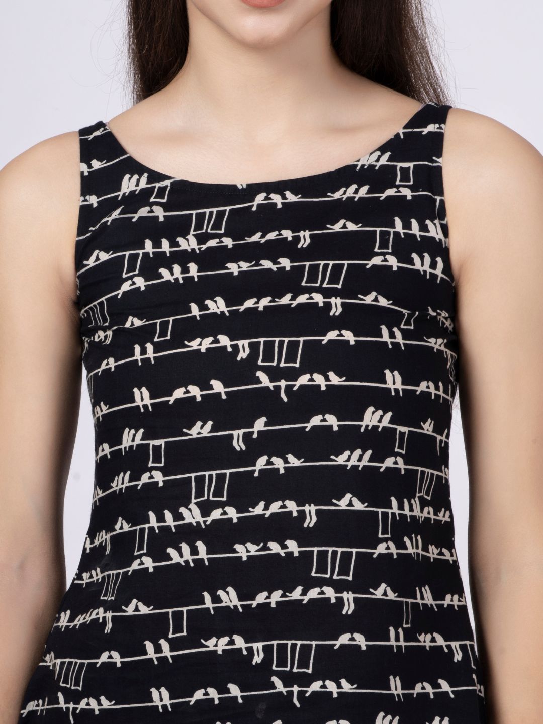 Black Bird Printed Sleeveless Top with Back Button-Down Placket