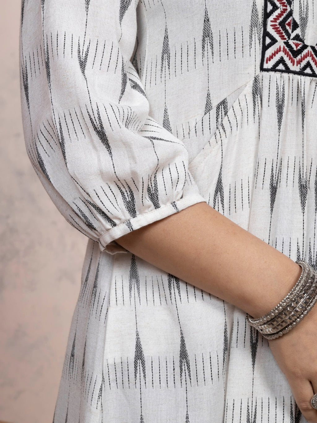 Ecru Dobby Kurta with Charcoal Motifs & Embroidered Yoke