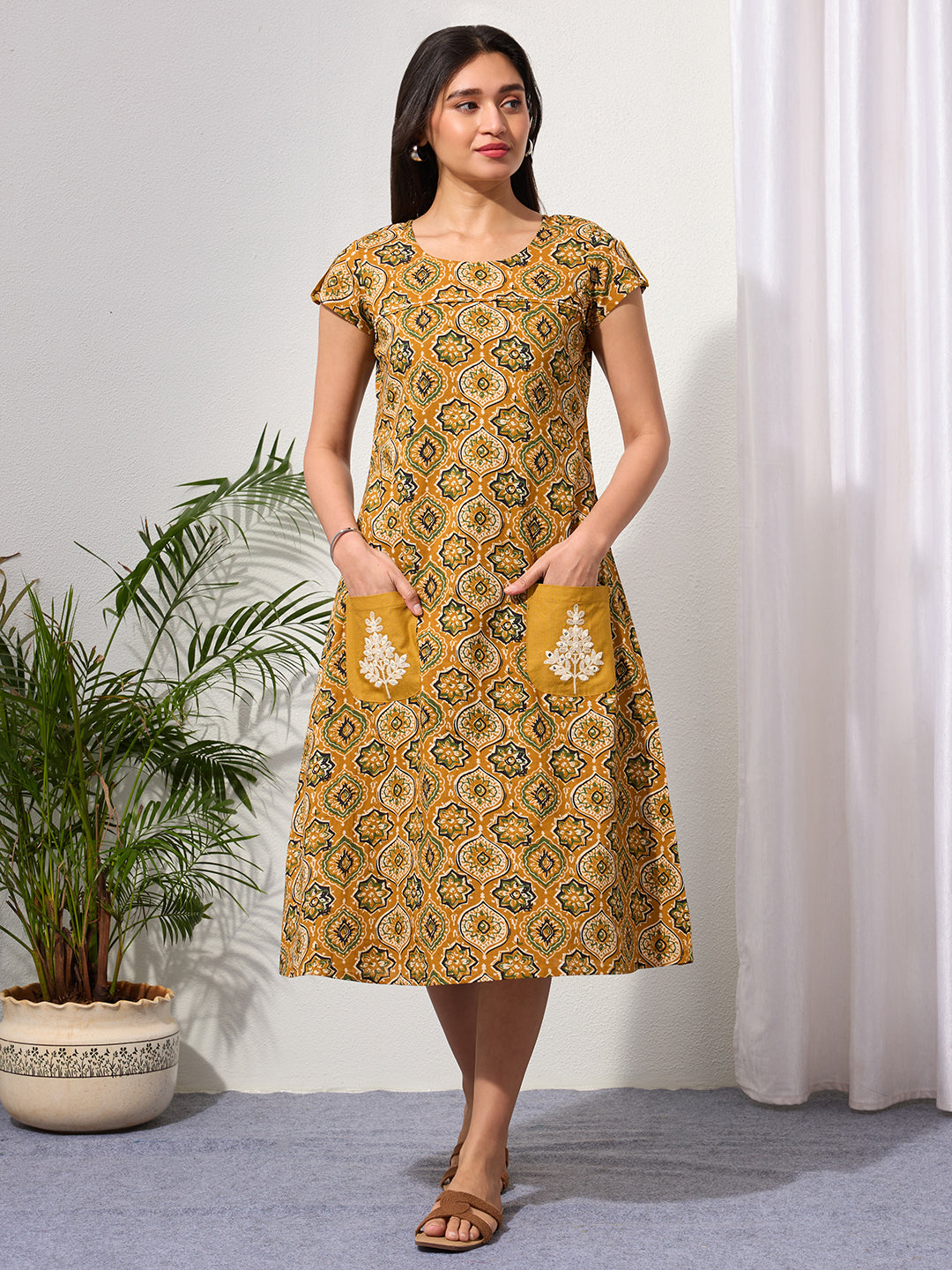 Mustard Ethnic Motifs Midi Dress with Embroidered Patch Pockets & Shoulder Tabs
