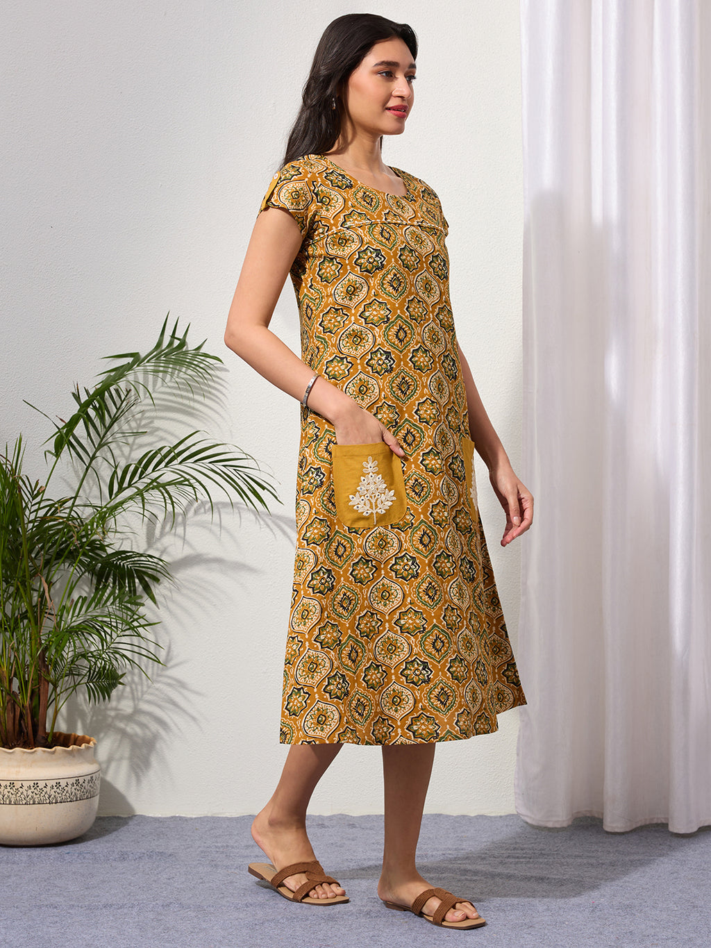 Mustard Ethnic Motifs Midi Dress with Embroidered Patch Pockets & Shoulder Tabs