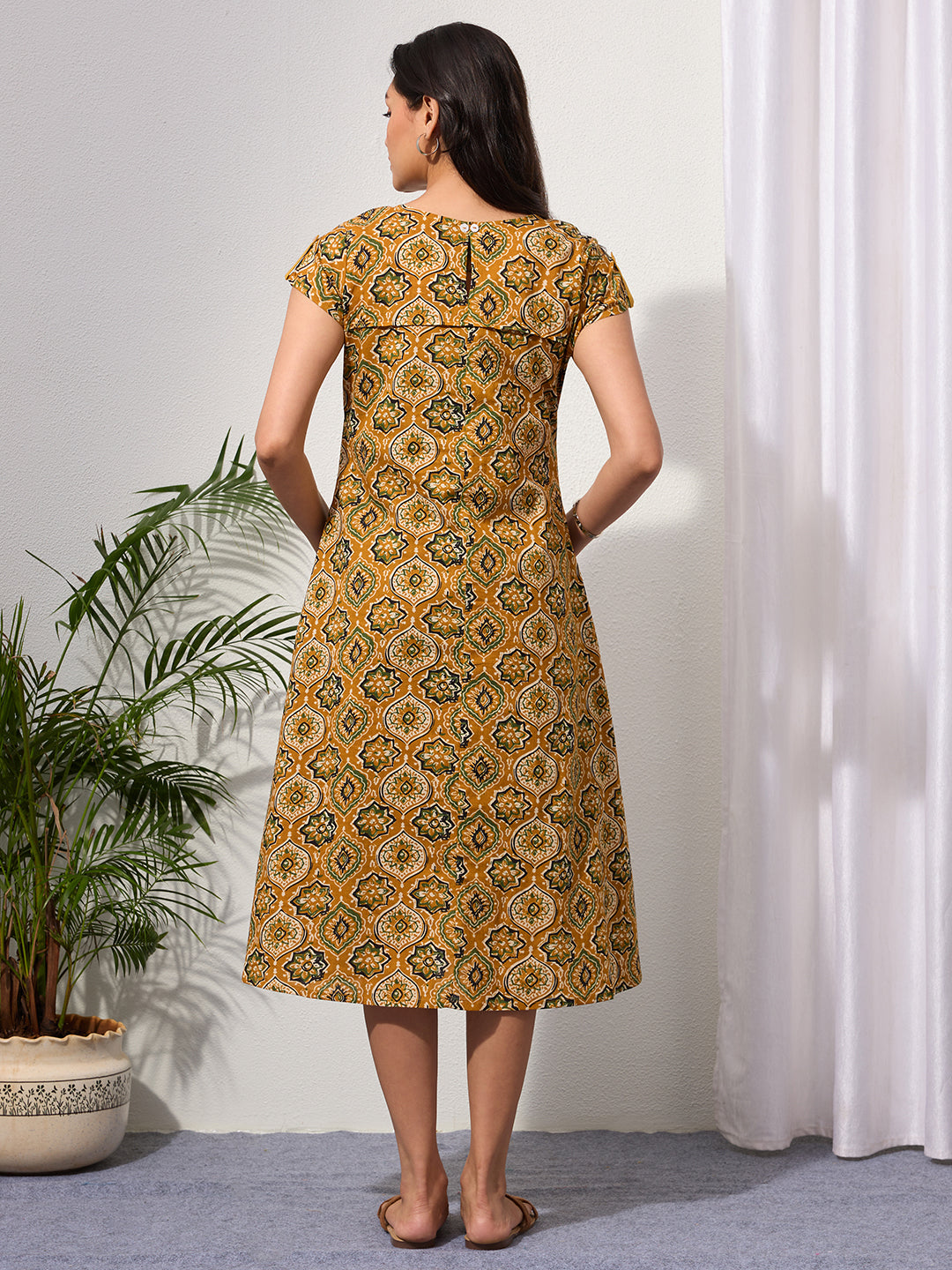 Mustard Ethnic Motifs Midi Dress with Embroidered Patch Pockets & Shoulder Tabs
