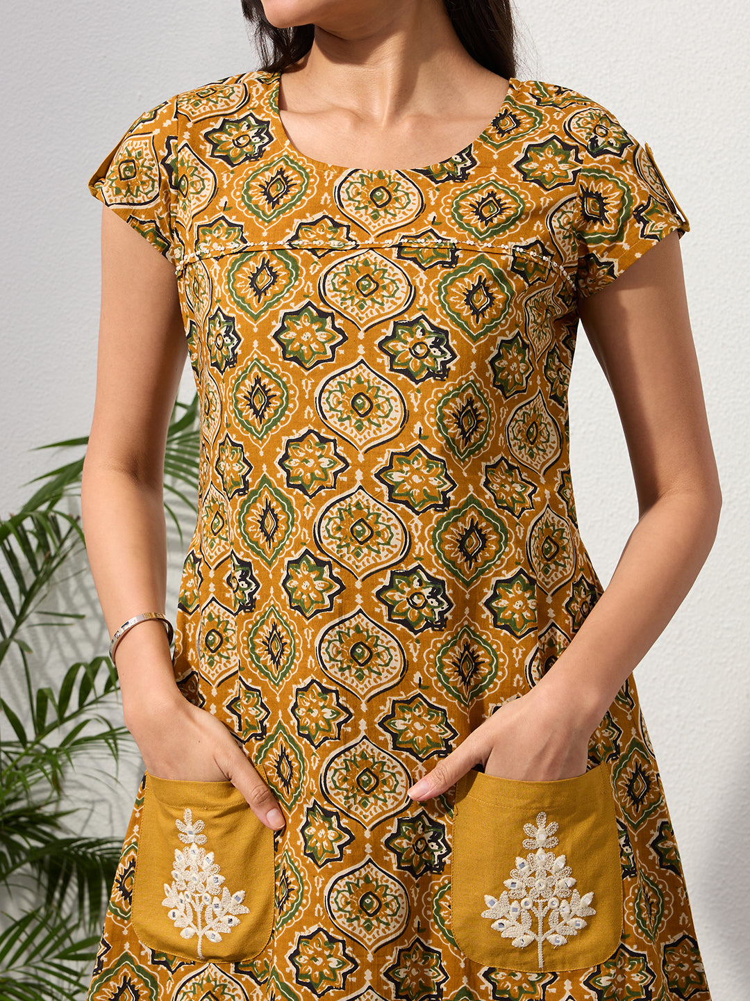 Mustard Ethnic Motifs Midi Dress with Embroidered Patch Pockets & Shoulder Tabs