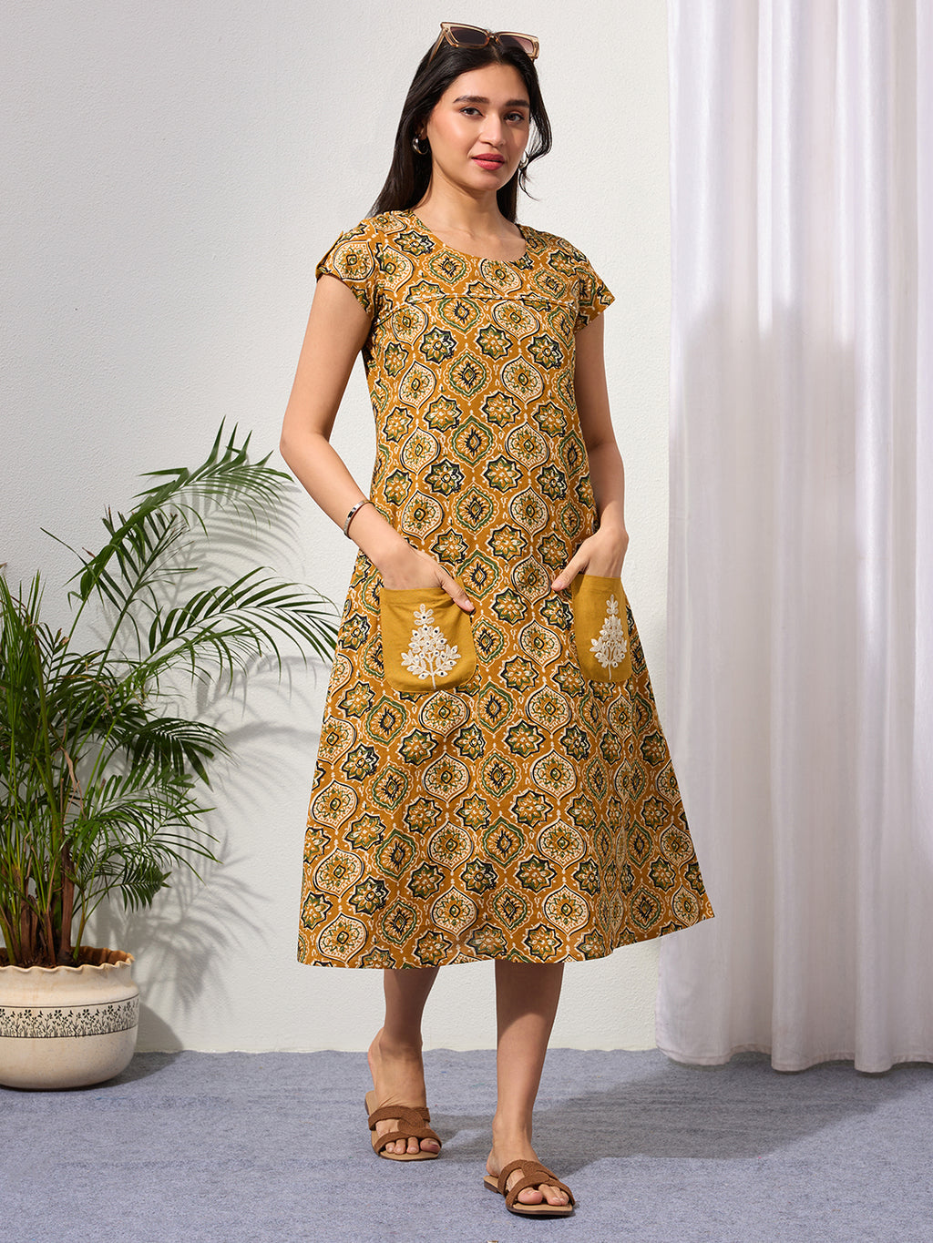Mustard Ethnic Motifs Midi Dress with Embroidered Patch Pockets & Shoulder Tabs