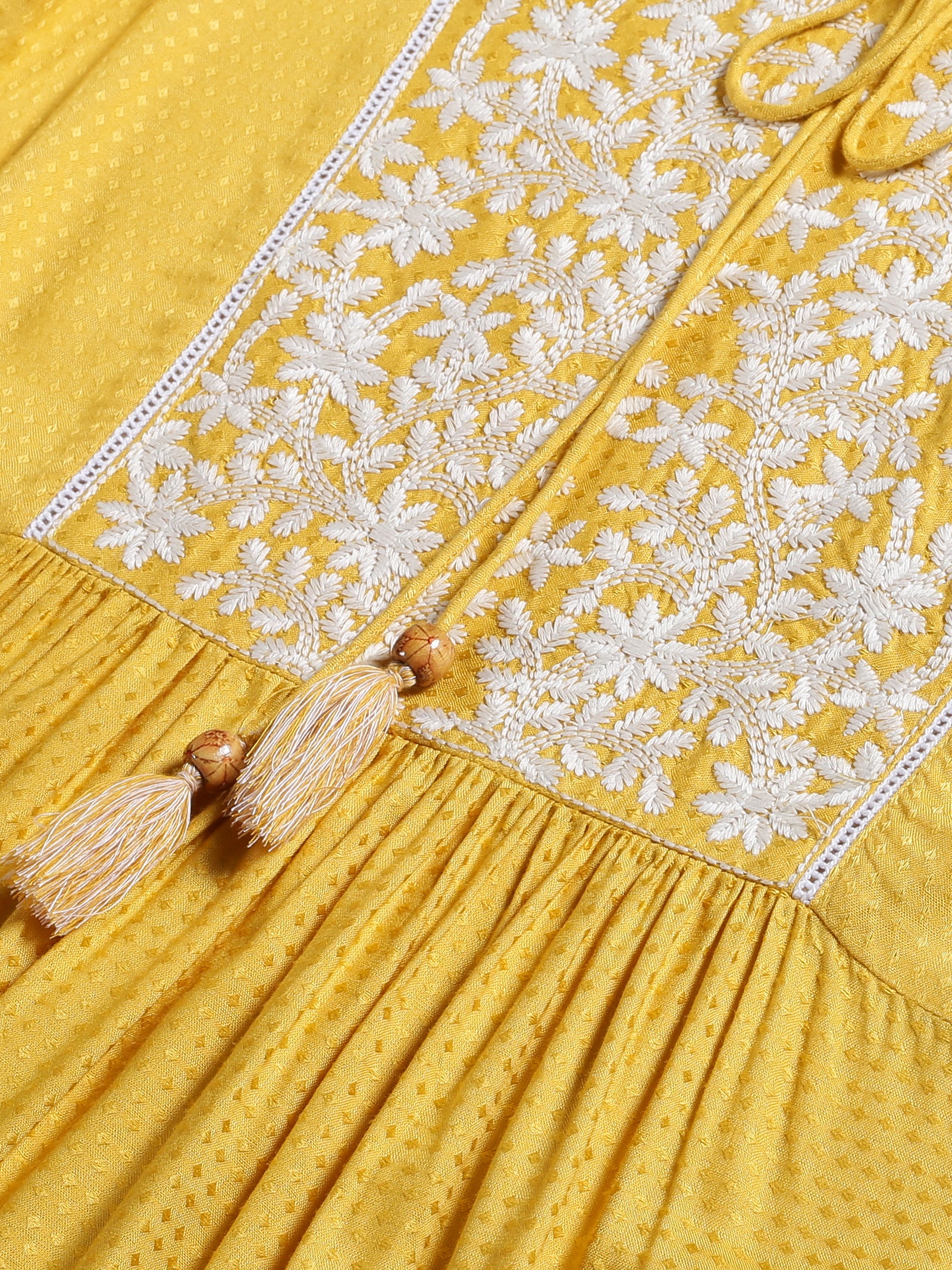 Yellow Embroidered Yoke Dress with Tie-up Neck with Dori & Tassels